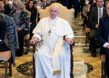 Pope sitting in chair